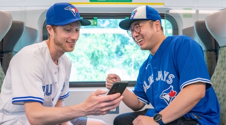 Happy Blue Jays fans going to a game