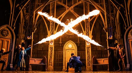 A fiery clash on stage between wizards during a scene of Harry Potter and the Cursed Child. (photo by Evan Zimmerman)