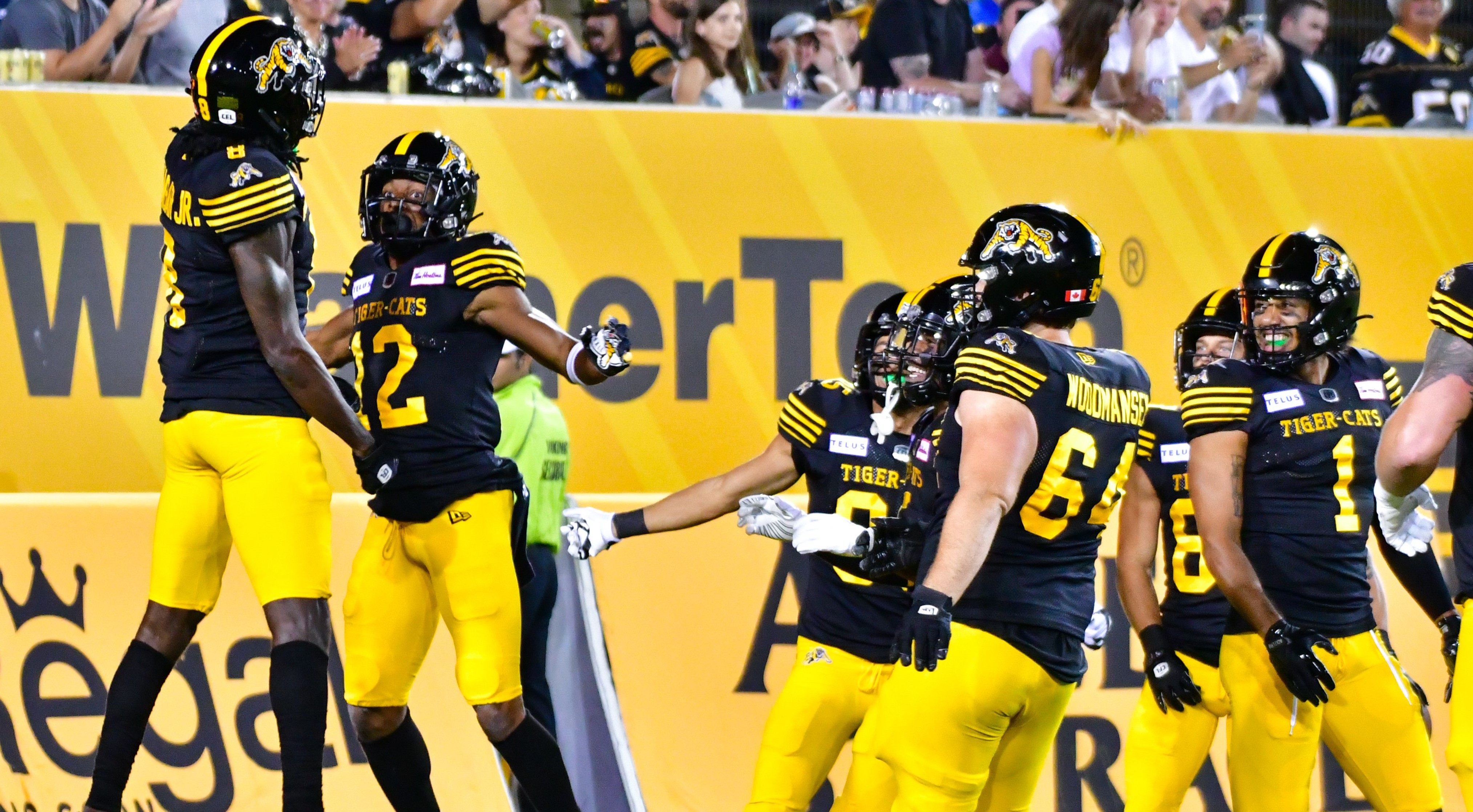 Hamilton Tiger-Cats celebrating a touchdown in the endzone